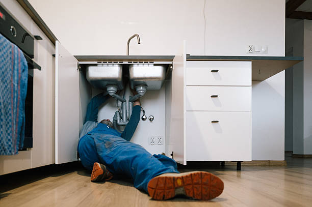 Professional Drain Cleaning technician working in Junction City, KS